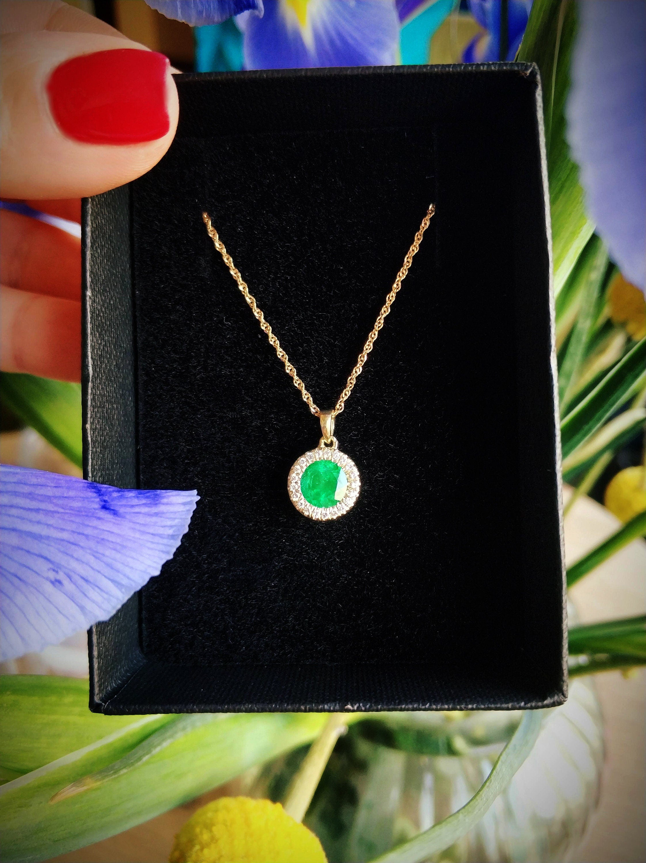 Natural Emerald and diamond halo necklace