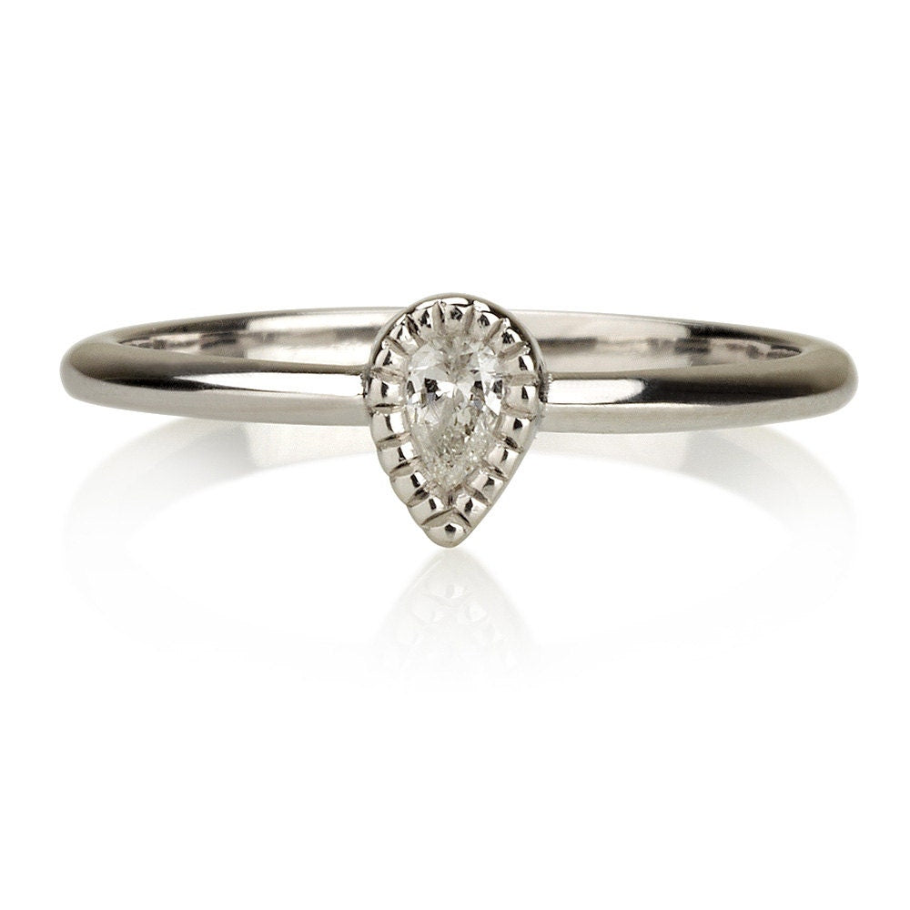 Pear shape solitaire ring